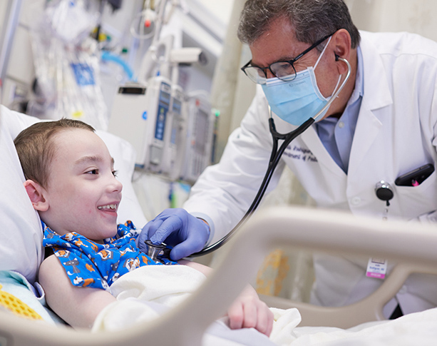 UMC doctor with child patient