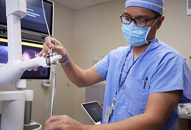  UMC doctor checking equipment in room