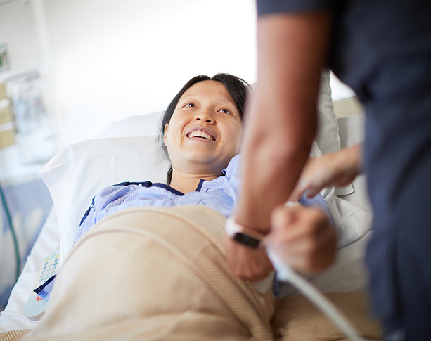 UMC patient in hospital bed