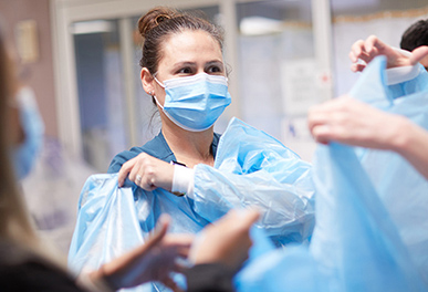 UMC Emergency Doctor with mask preparing for surgery